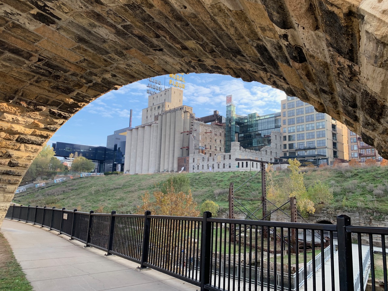 A view of the museum from beneath one of the arches of the Stone Arch Bridge.